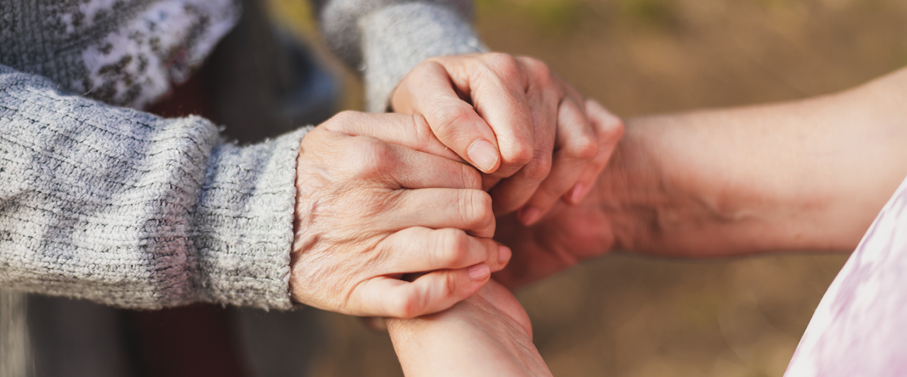 two people holding hands
