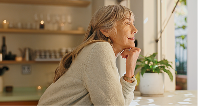 woman looking out window