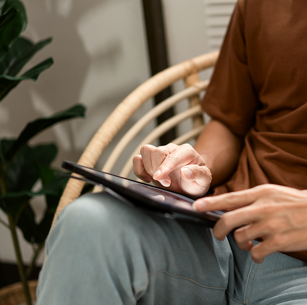 man using iPad
