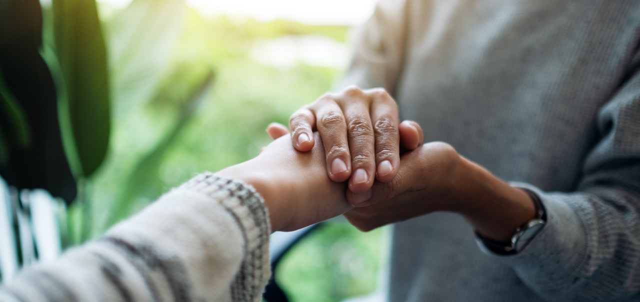 two hands touching